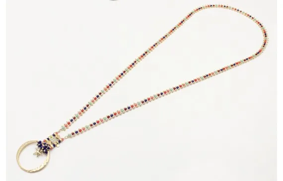 Collar largo cadena cristales multicolor, semicirculo oro mate con burruño facetadas azules y estrella de mar colgando oro mate.Largo 74cm Ordena Ya